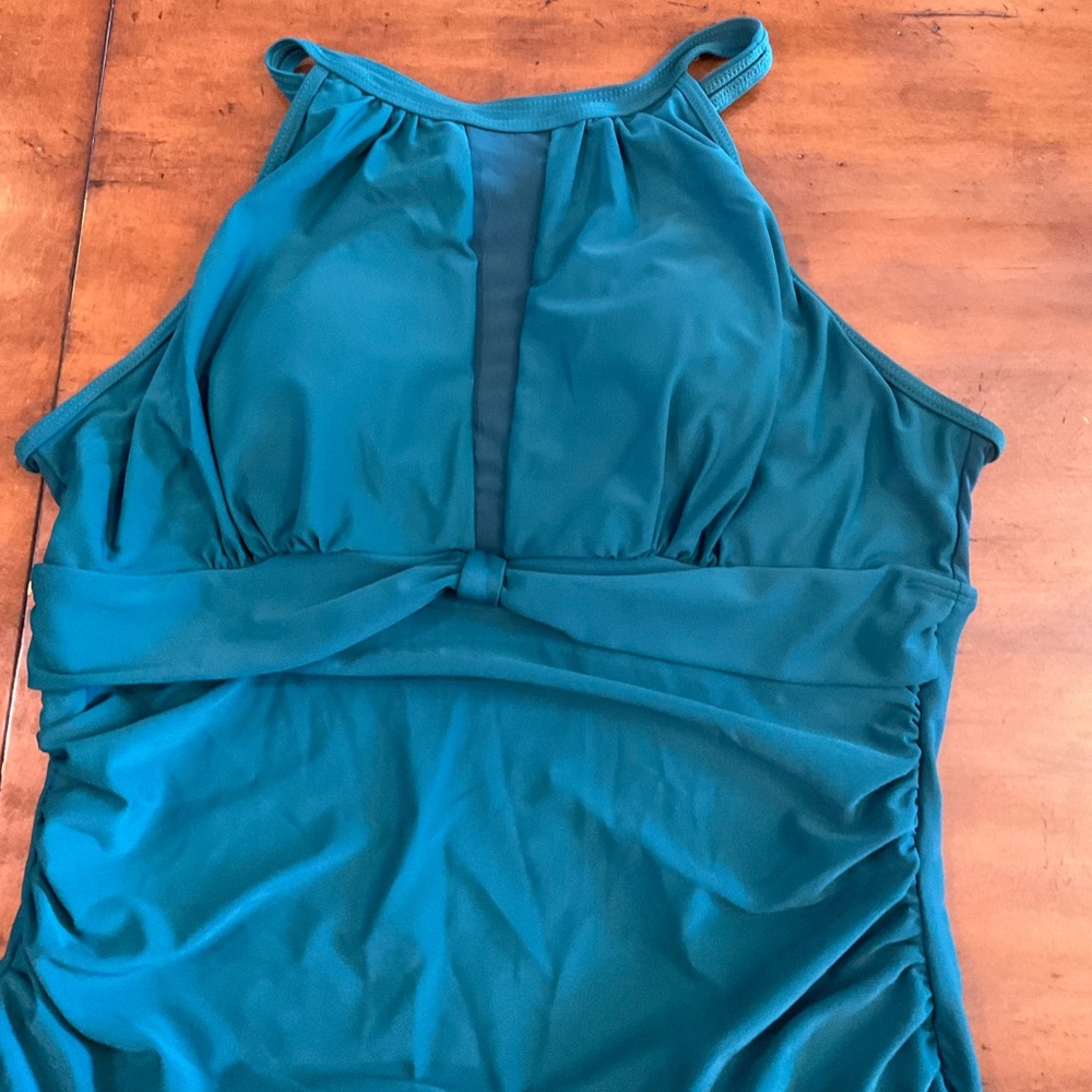 Women’s NWT, one piece, teal blue swimsuit by Tempt Me, size XL